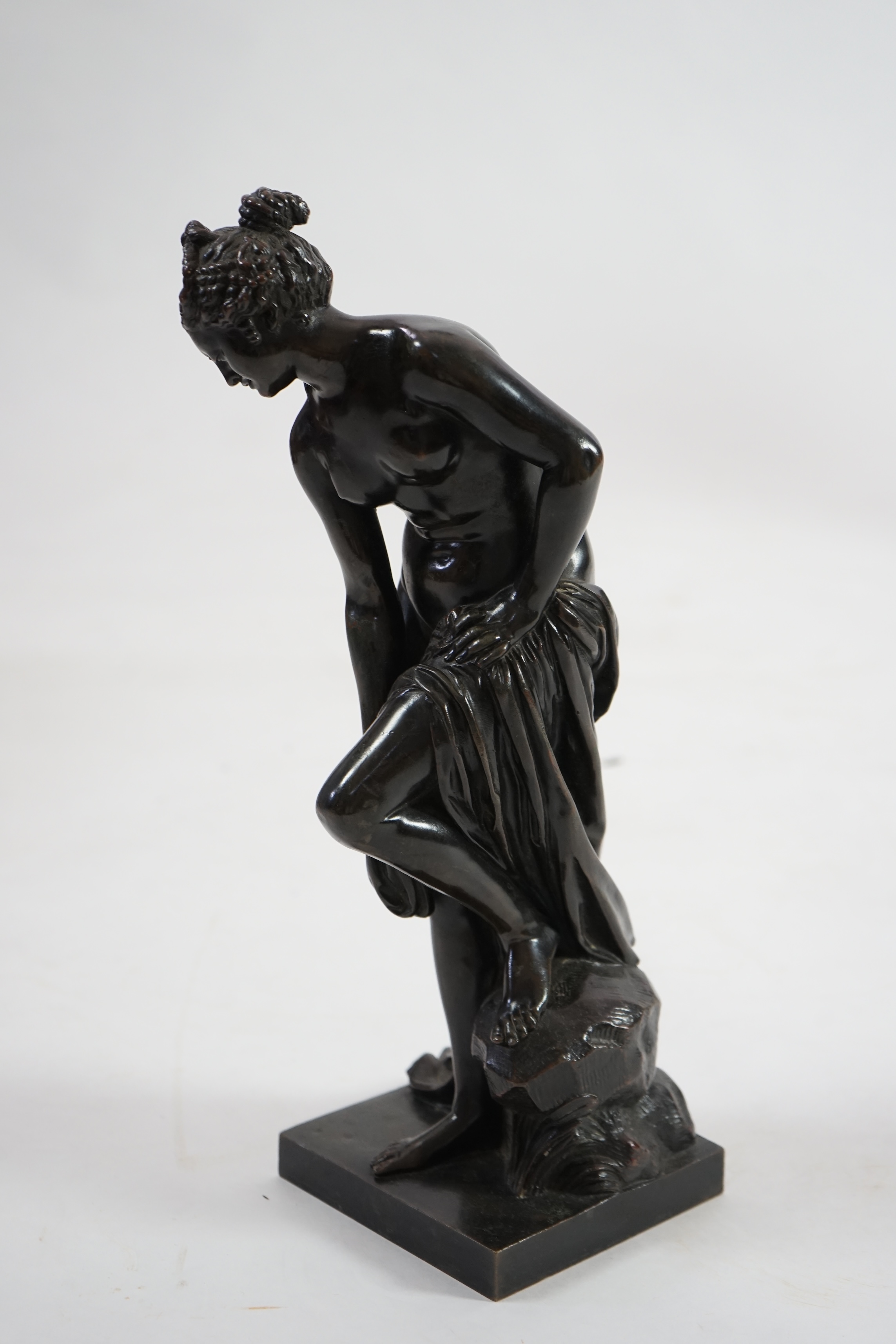 After Christophe-Gabriel Allegrain (1710-1795), a late 19th century bronze model of Venus sortant du bain